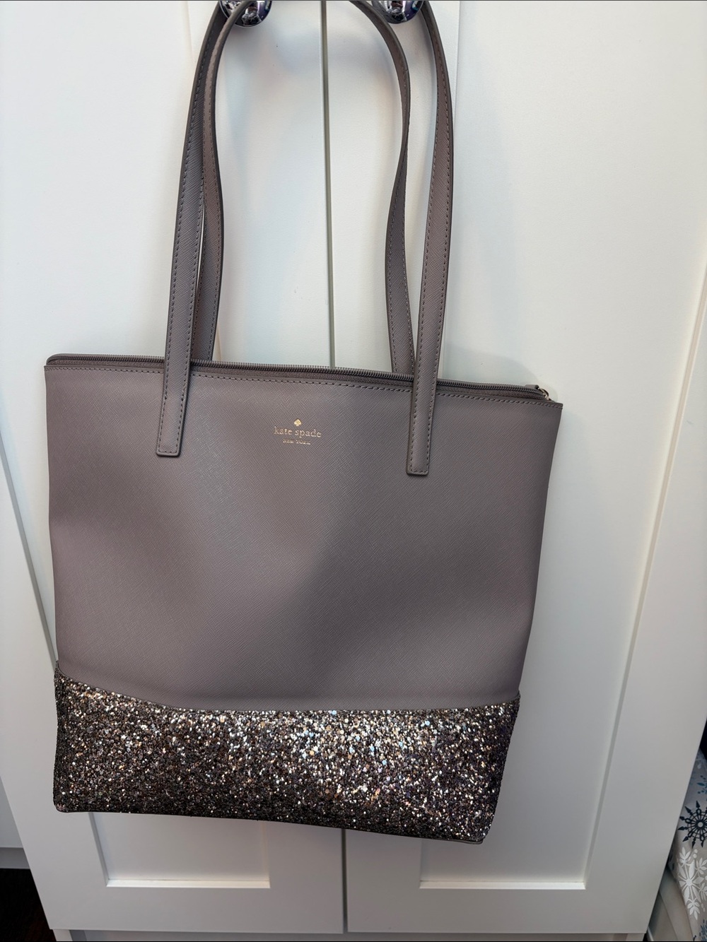 kate spade taupe tote with glitter-bottom trim